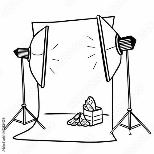 Black and white illustration of a product photography setup with softbox lights and a box of food items