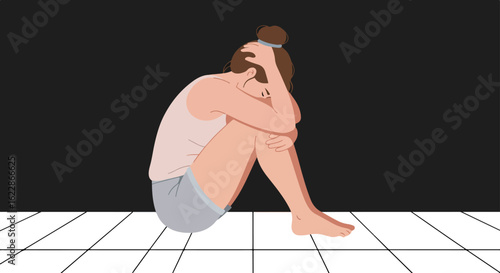 Woman sitting alone in quiet reflection on white tiled floor with black background