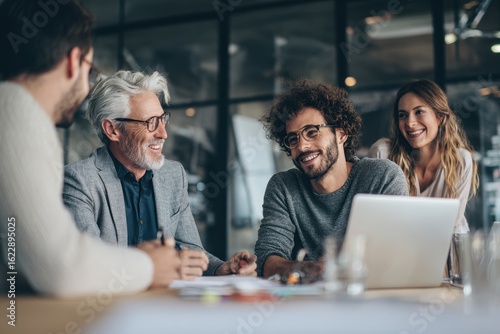 A team of tech professionals discussing the technical requirements of a new business project. Their expertise is vital for developing a robust and scalable solution for the market's needs.