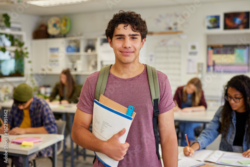 Papier peint Portrait of smiling latin student at high school
