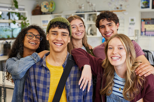 Portrait of happy smiling multiethnic classmates at high school