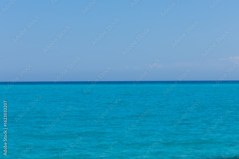 Obraz premium Turquoise water of the Mediterranean Sea on a sunny day.