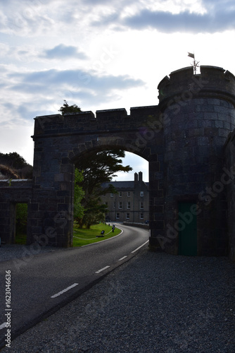 Stone Portcullis with a View of a Castle