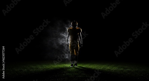 Isolated Football Player on Field with Spotlight Effect, Dramatic American Football Image in Yellow and Black