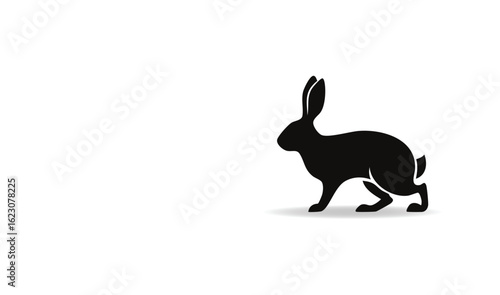 Silhouette of a Hare Standing Still on a White Background with Subtle Shadow
