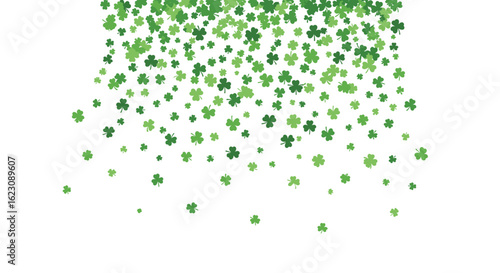 A shower of green clover leaves falling down from above a white background for your design projects