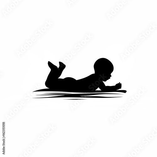 Silhouette of a baby lying on stomach doing tummy time on white background
