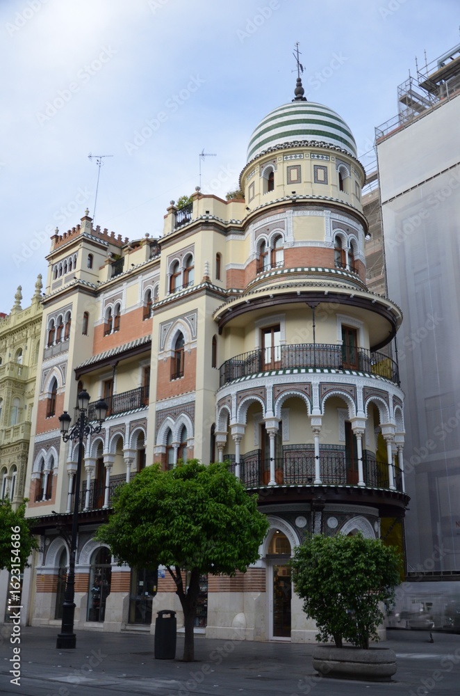Fototapeta premium Seville, Spain 03.25.2019: View of the historic La Adriatica Building in Seville