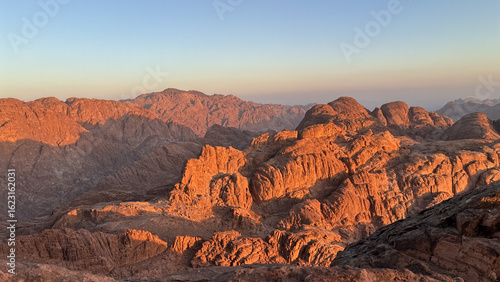 Sunlit Mountains at Sunset in Arid Landscape