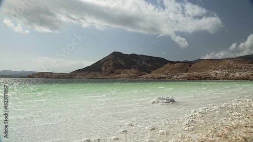 Ground-Level View of Lac Assal’s Salt Crust and Turquoise Waters in Djibouti