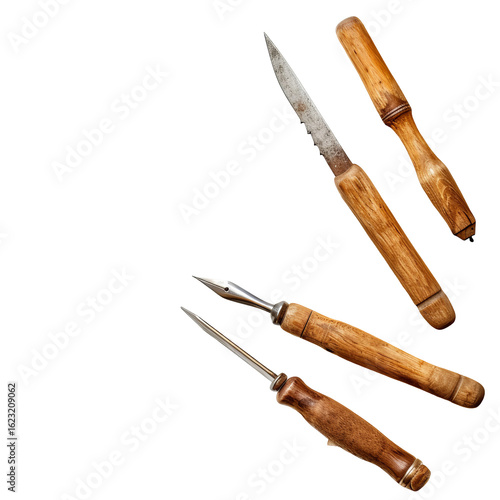 Close-up of vintage woodworking tools with wooden handles.  Several carving and gouging tools, showing aged metal and light-colored wood