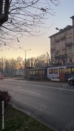 Electric Tram at Sunset on Turin Streets in Winter