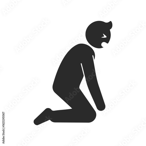 Silhouette of person in kneeling prayer position