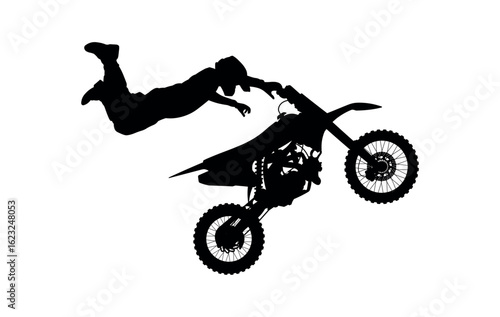 Silhouette of a Motocross Rider Performing Extreme Freestyle Tricks in the Air