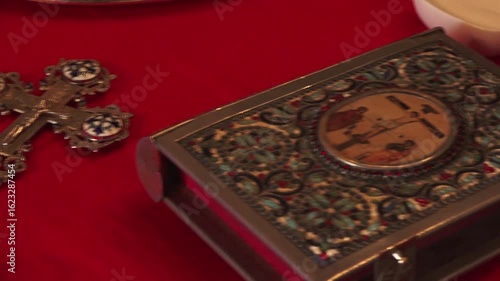 Close up shot of a cross in Orthodox church. Christ cross in church. Wedding concept
