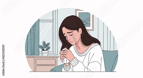 Sorrowful young woman weeps, holding a crumpled tissue in a softly furnished room of subdued hues