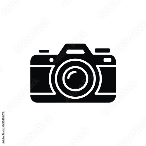 Black silhouette of a modern digital camera on a white background