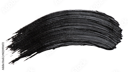 Dark smudge of mascara on black background