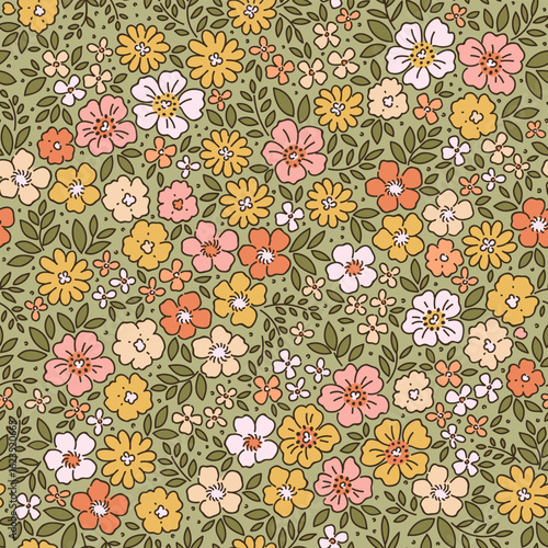 Vintage floral background. Seamless vector pattern for design and fashion prints. Flowers pattern with small yellow, orange and peach flowers on a light gray green background. Cute Ditsy baby style.

