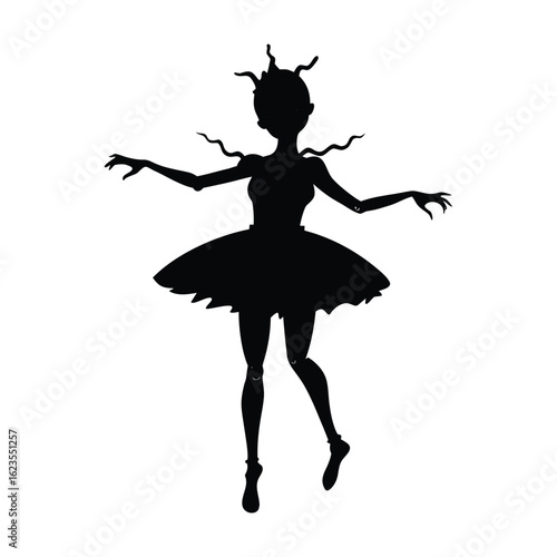 Silhouette of a ballerina with a tutu and pointe shoes