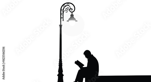 Silhouette of a Person Reading Under a Glowing Streetlight, Evening Leisure and Urban Relaxation, Book and Lamp Post