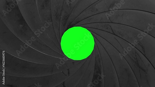 Close-Up of Camera Lens Iris Opening and Closing on Green Screen