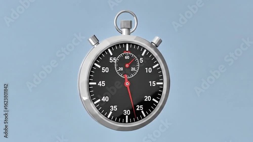 A silver stopwatch with a black face and red second hand is displayed against a light blue background.
