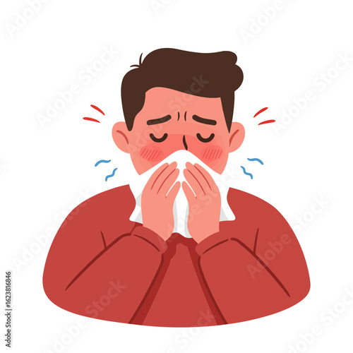 Sick young man sneezing into tissue while feeling unwell at home  