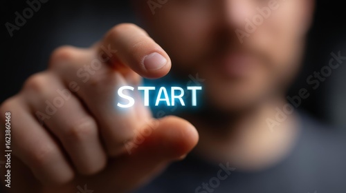 Wallpaper Mural A savvy entrepreneur activates their startup concept by pressing the start button on a sleek virtual interface. Torontodigital.ca