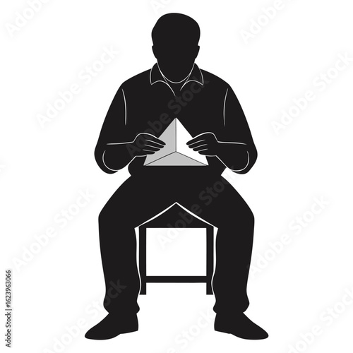 Solid Black Silhouette of Man Folding Origami – Seated Pose Flat Vector on White Background