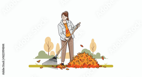 Woman raking leaves into a pile in a yard with trees