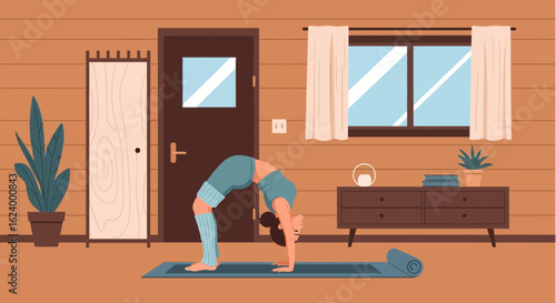 Woman Practicing Wheel Yoga Pose At Home In Cozy Interior Place