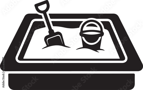 Black and white icon of sandbox with shovel and bucket sandpit spade