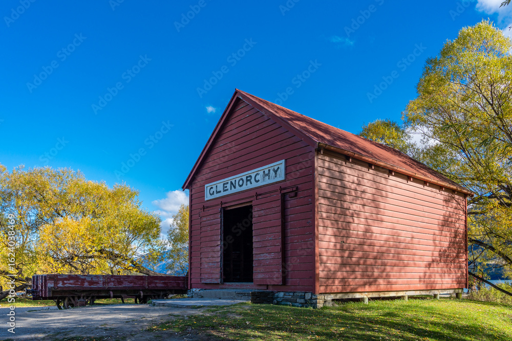 Obraz premium Historic Glenorchy Railway Station Building Under Blue Sky, Otago Region, South Island New Zealand