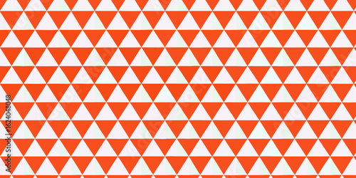 Seamless geometric pattern of orange and white triangles creating a dynamic and modern background