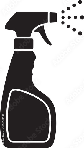 Black spray bottle with liquid droplets spraying out cleaning