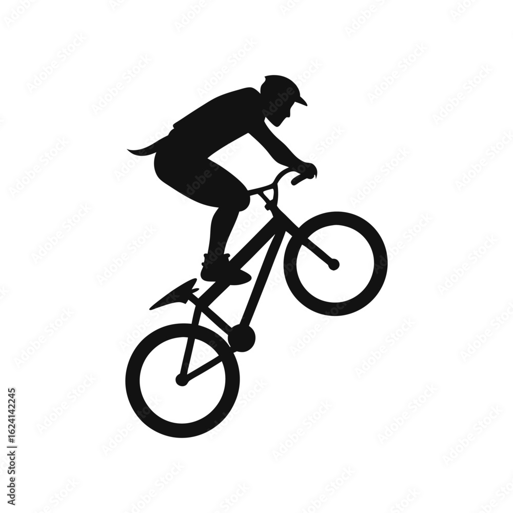 Obraz premium Mountain Biker Performing Wheelie Silhouette