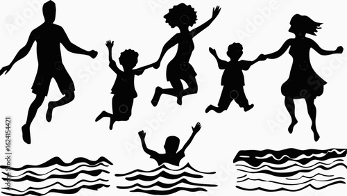 Silhouetted family enjoying a day at the beach jumping and swimming in the water having lots of fun together