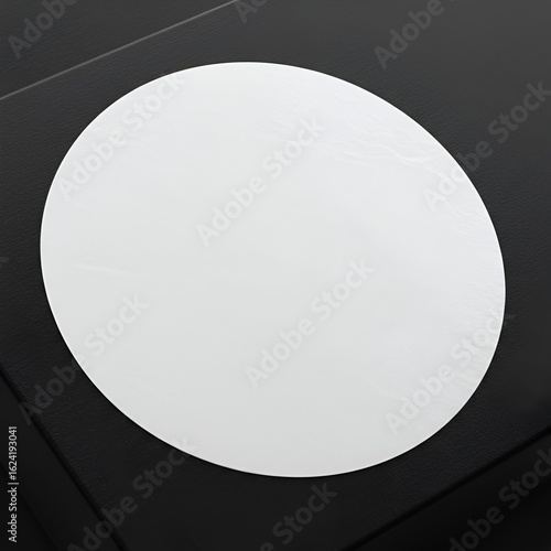 Blank white circle on dark background
