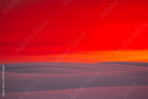 Red sky over the clouds view