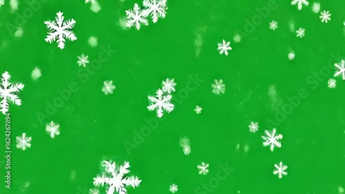 White Snowflakes Falling on Green Screen