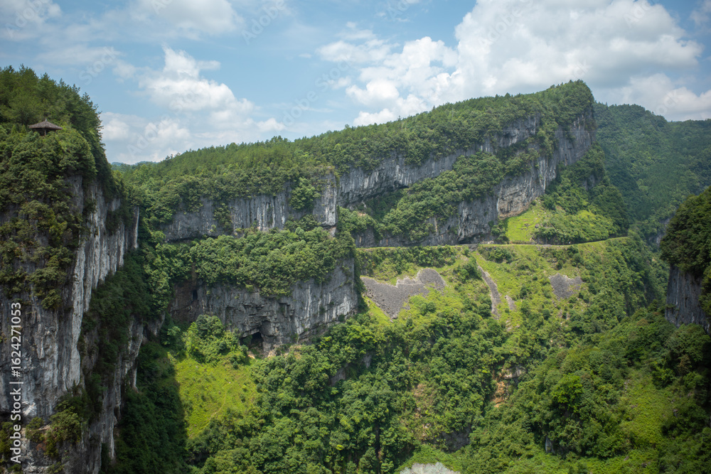 Lush Green Mountains with Winding Road Lush Green Mountains with Winding Road