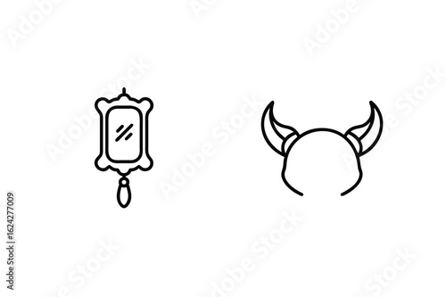 Ornate mirror and horned head outline hanging reflection