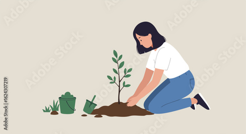 Young woman plants small tree. Bucket and shovel in the background. Environment use