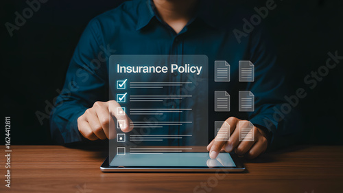 Man reviews insurance policy details on digital tablet, confirming coverage with digital checkboxes.