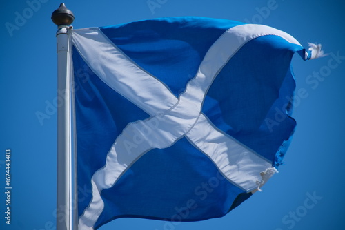 Scottish flag on a flagpole flapping in the wind, Saltire, Saint Andrew's Cross
