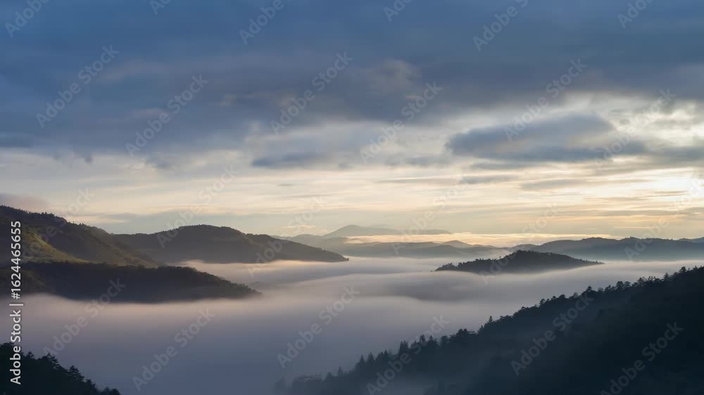 Serene Mountain Landscape at Dawn - Misty Valleys and Soft Light Serene Mountain Landscape at Dawn - Misty Valleys and Soft Light