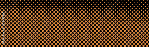 Abstract creative pattern pop art comic style golden halftone isolated on a black background. Dotted circle vector illustration. Abstract halftone background. Dot spray gradation for your design.