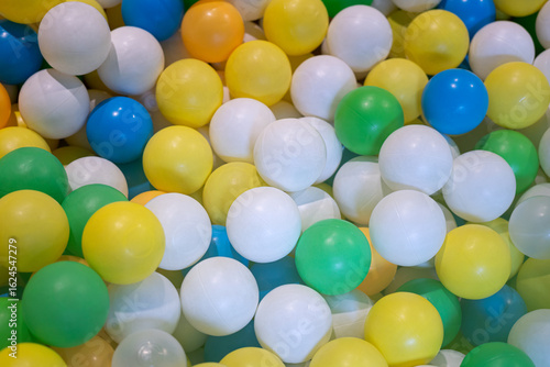 Wallpaper Mural Colorful plastic balls toy for children at playground. Sport and recreation object, selective focus. Torontodigital.ca