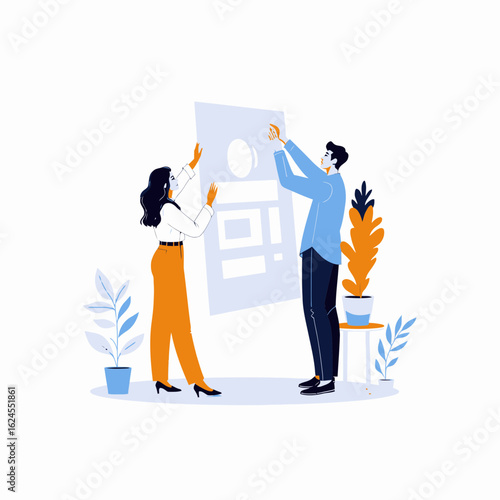 Two people collaborating on design project in modern workspace  